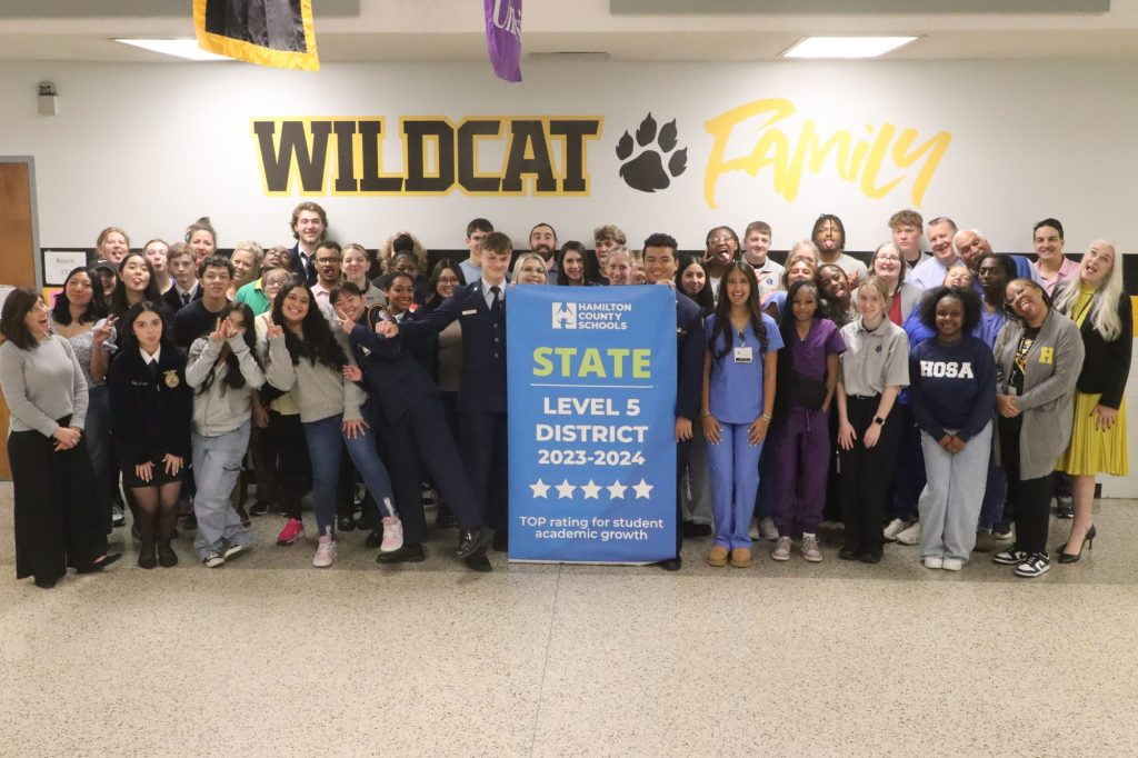 IMG_1931 Students pose for a banner presentation photo