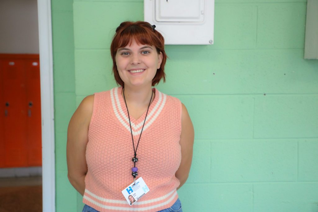 0D5A2035-2 teacher smiling in classroom