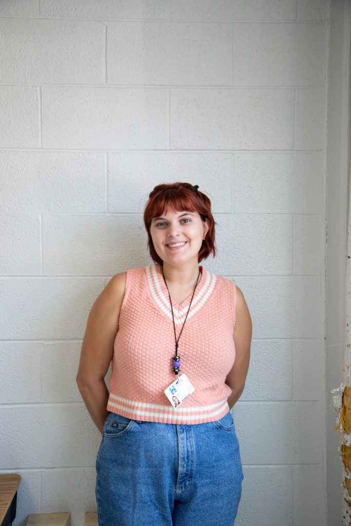 0D5A2041 teacher smiling in classroom