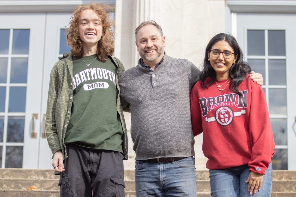 CSAS Ruby Questbridge-16 Students pose for a photo with a teacher