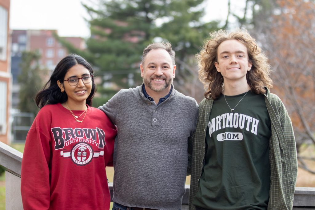 CSAS Ruby Questbridge-18 Students pose for a photo with a teacher