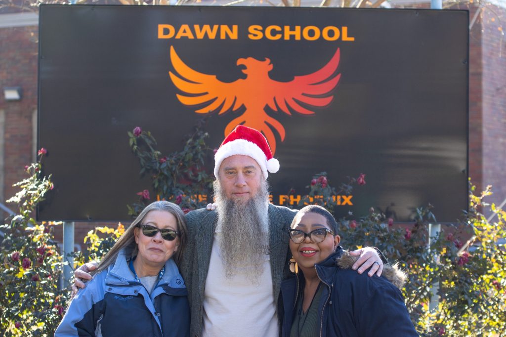 Dawn School Edit A group poses for a photo