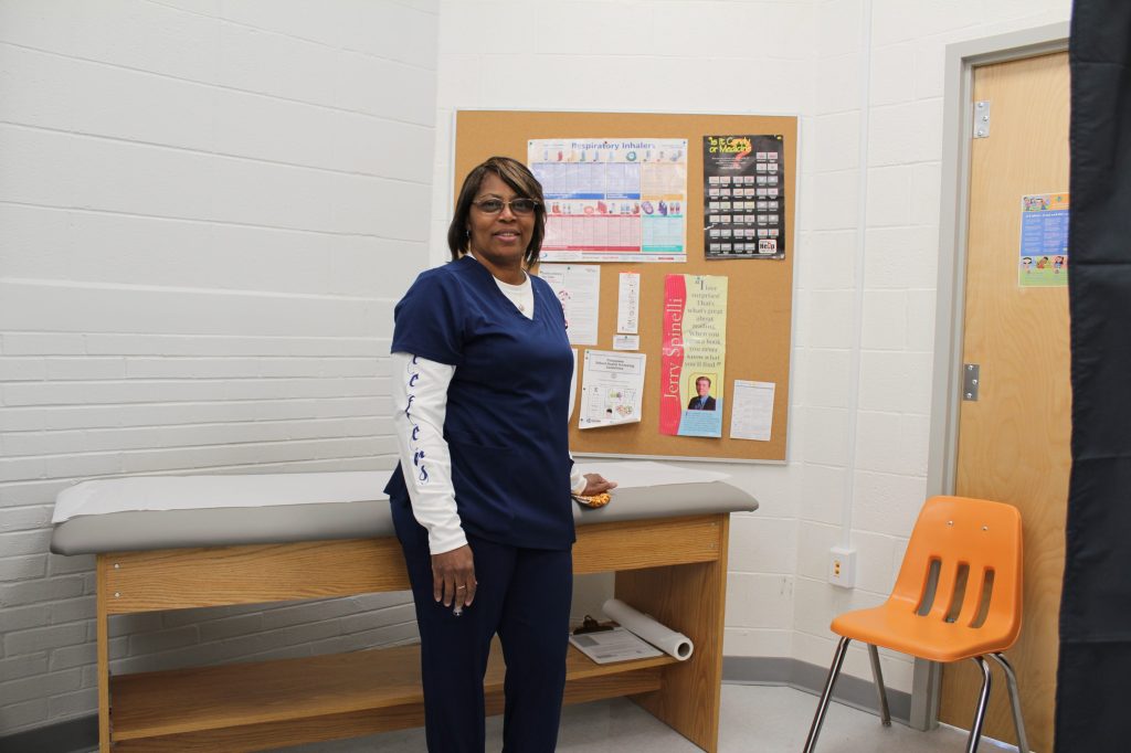 nurse in howard connect medical exam room