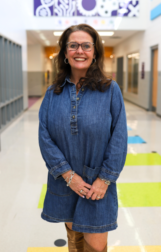 NEWSROOM COVER - Storybook Trail-4 Principal Dr. Lorie Collier in Harrison Elementary School hallway