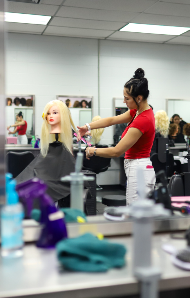 A cosmotology student works