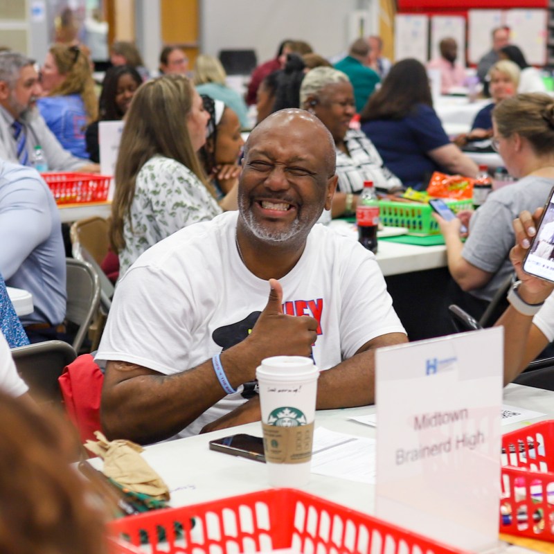 A man gives a thumbs-up