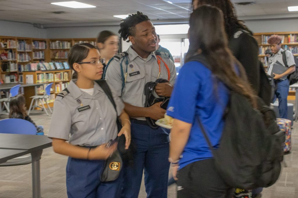 RBH Mental Health Week-21 students talking in jrotc uniform in the library