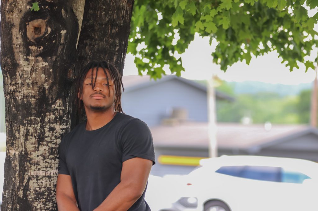 A student poses for a photo