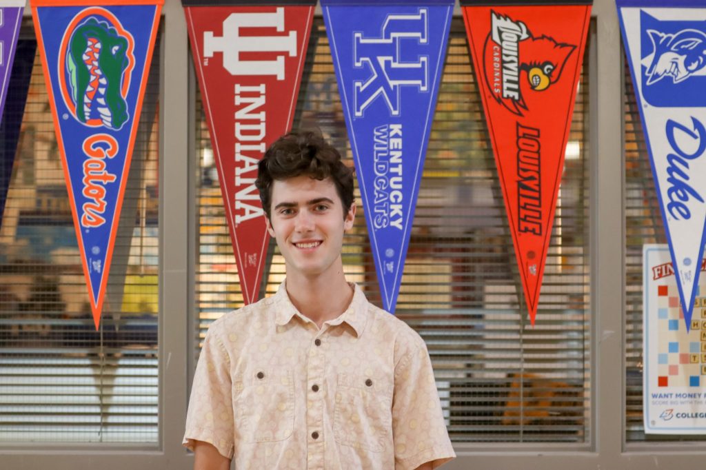 A student poses for a photo