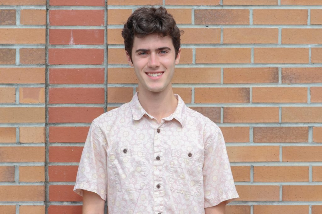 A student poses for a photo