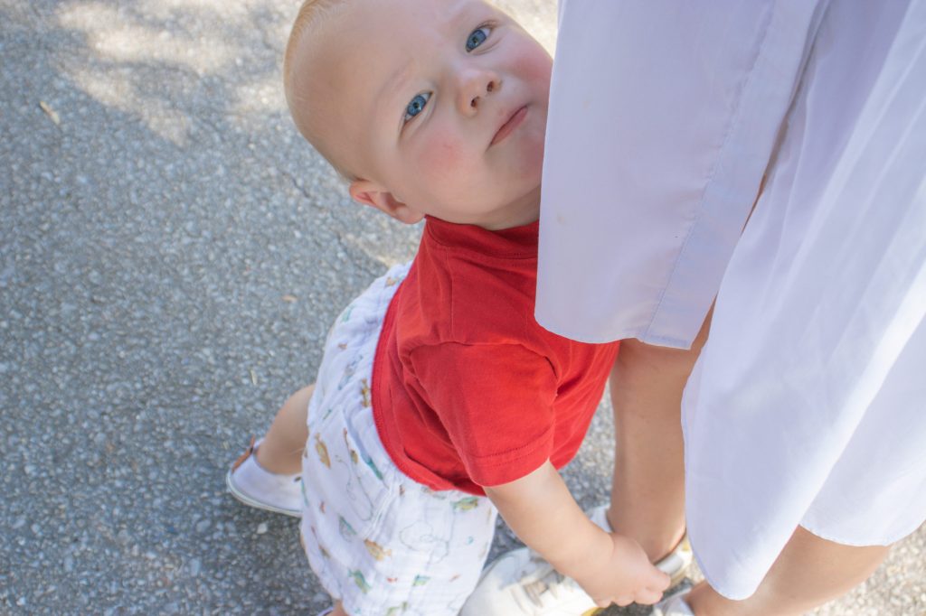 A child looks at the camera