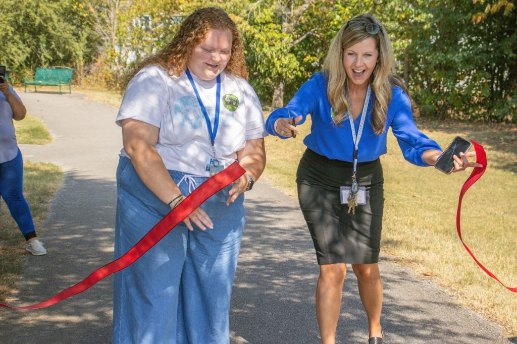 A ribbon is cut