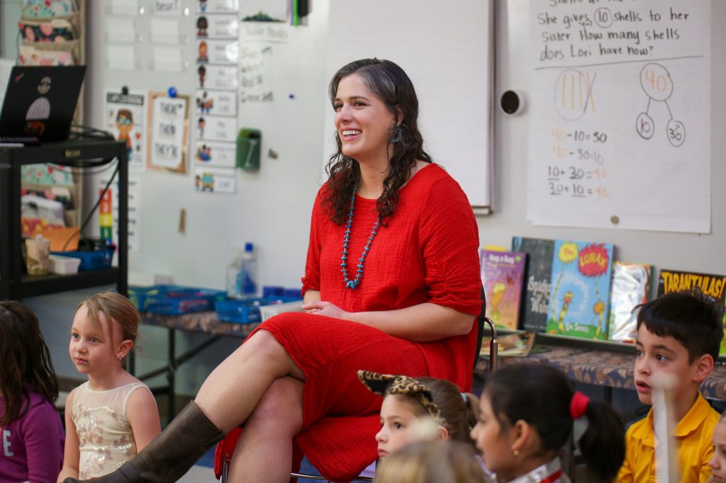 TeacherOfTheYear-01 A teacher smiles