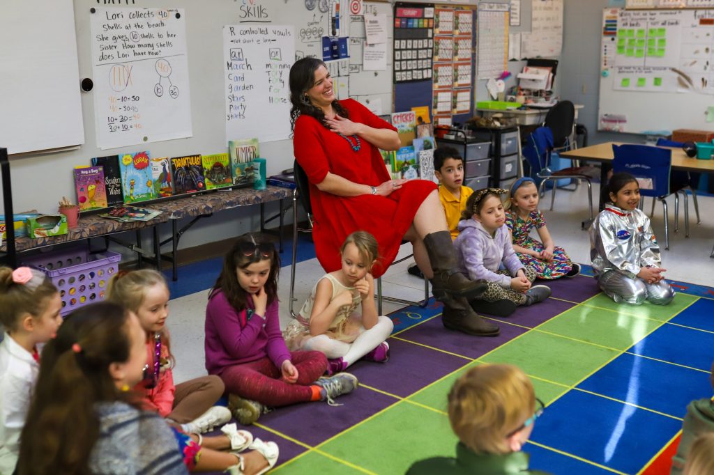 TeacherOfTheYear-08 A teacher smiles in class