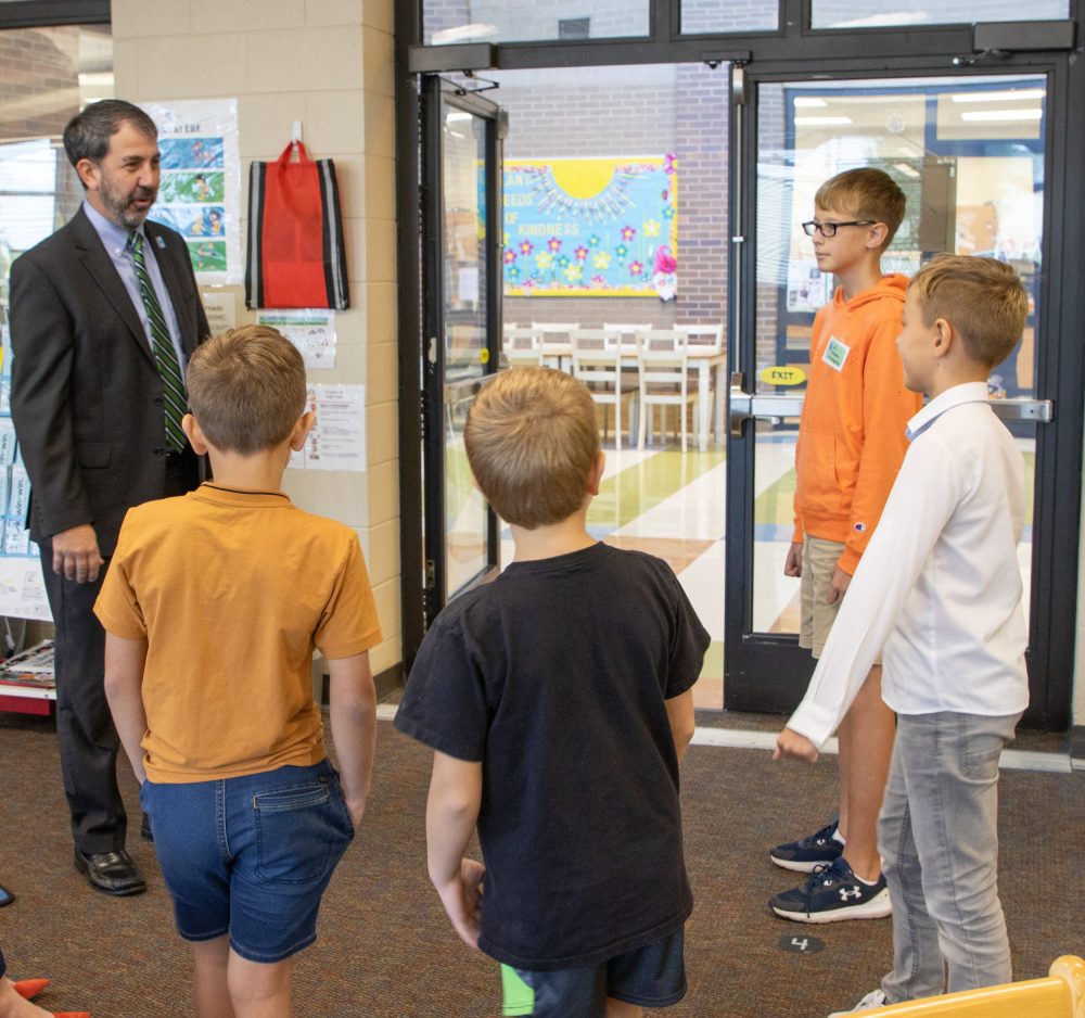 Ukraine Delegate Visits EBE-3 kids talk with dr Robertson during East Brainerd Elementary Ukraine Mayor Visit