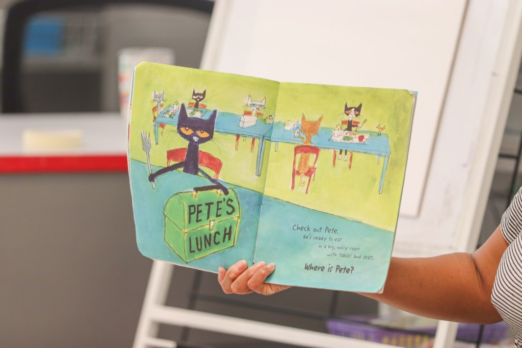 teacher reading to students