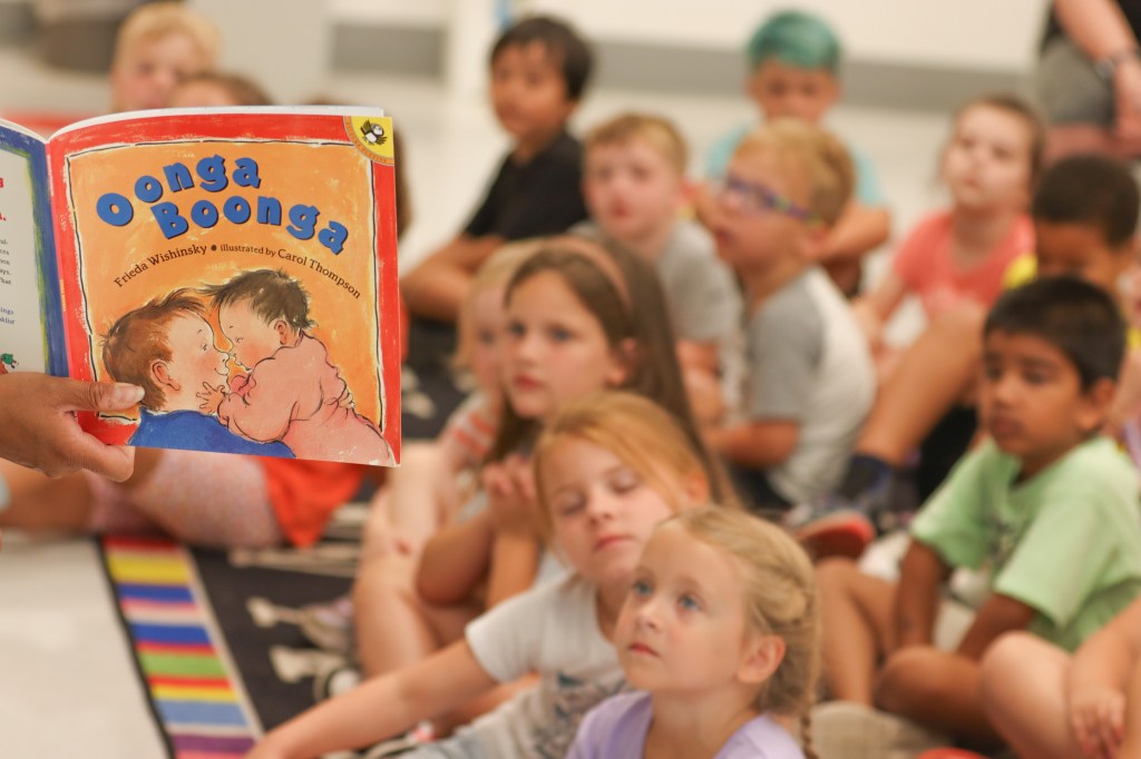 teacher reading to students