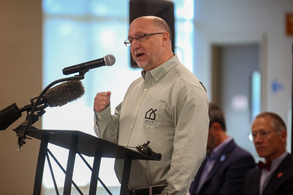 Franklin-01 A man speaks at a podium