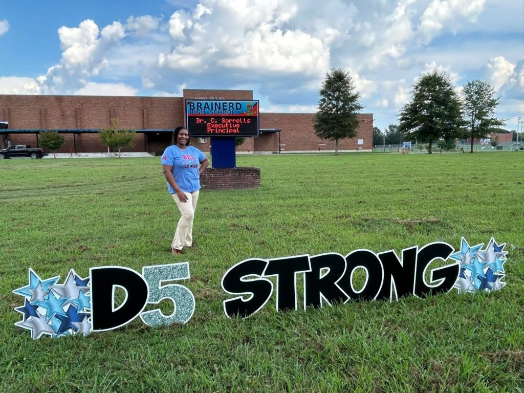 IMG_0722 Dr. Sorrells stands in front of Brainerd High