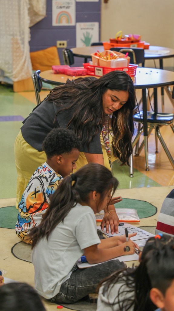 teacher with student