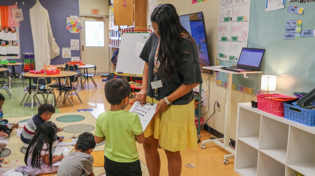 teacher with student