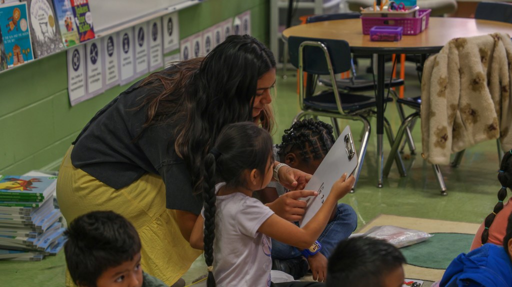 teacher with student